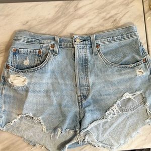 Levi’s 501 light wash ripped jean shorts